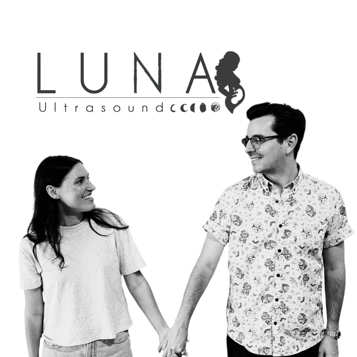 A man and woman holding hands in front of a luna ultrasound logo