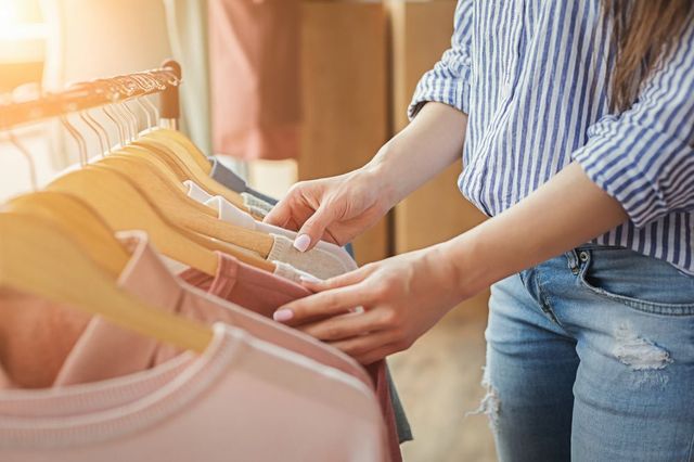 Woman Choosing Clothes — Texas — Texas Tax Back