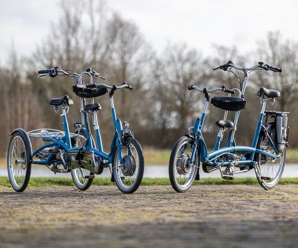 Kivo Plus is een kind ouder driewieltandem voor een volwassen persoon die achter zit en een kind dat voor zit.