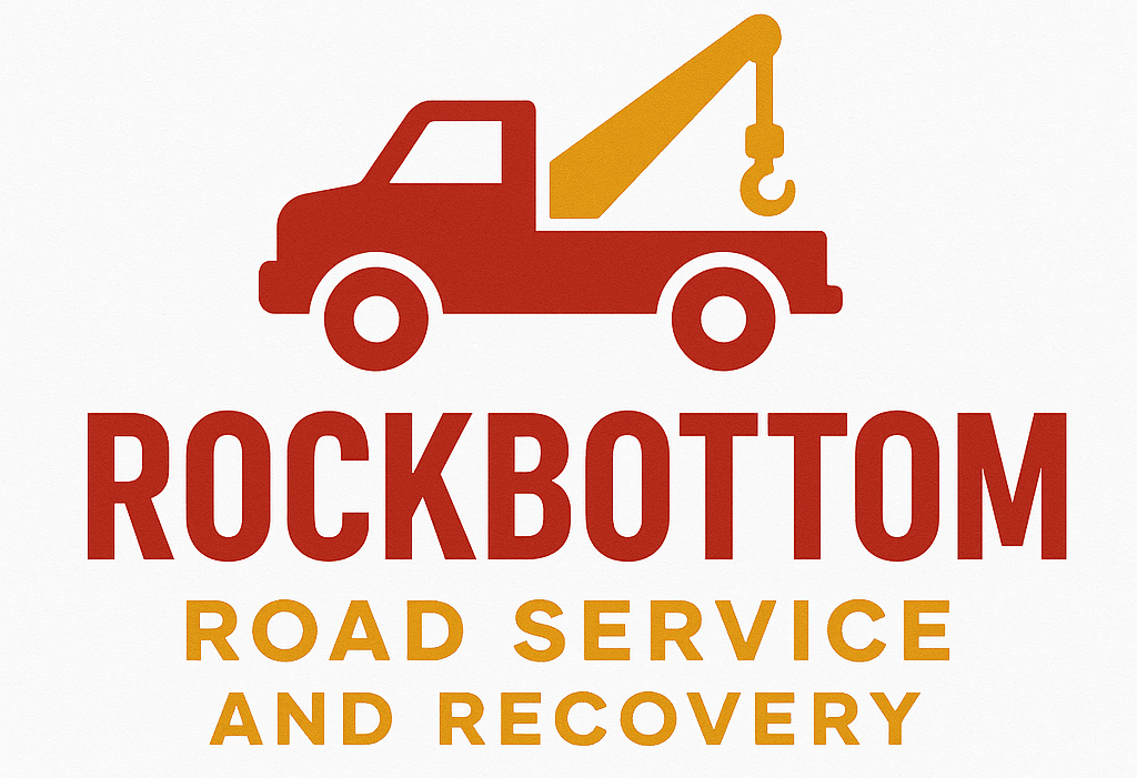 Red tow truck with yellow crane, "Rockbottom Road Service and Recovery" logo.