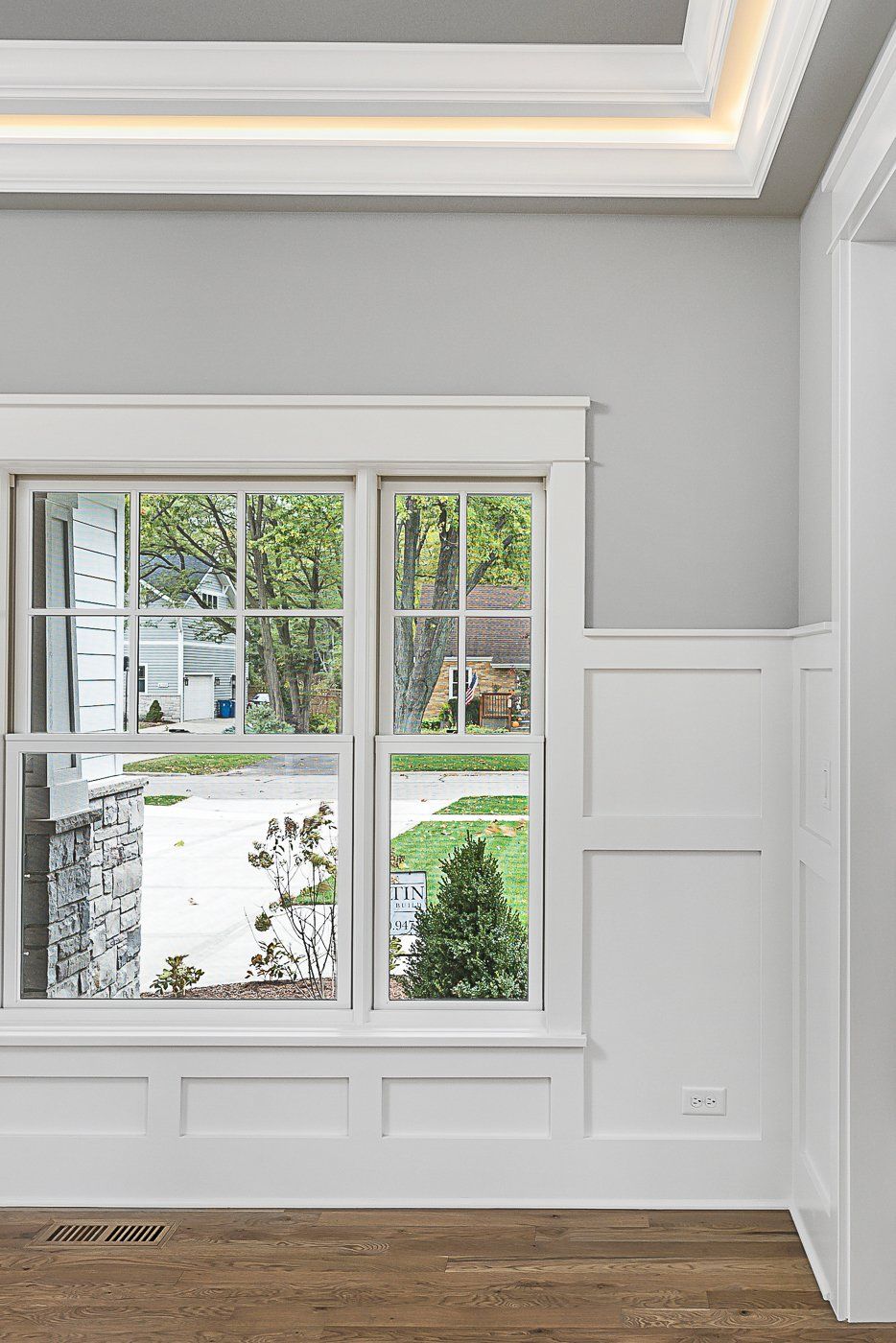 There is a large window in the middle of the room.