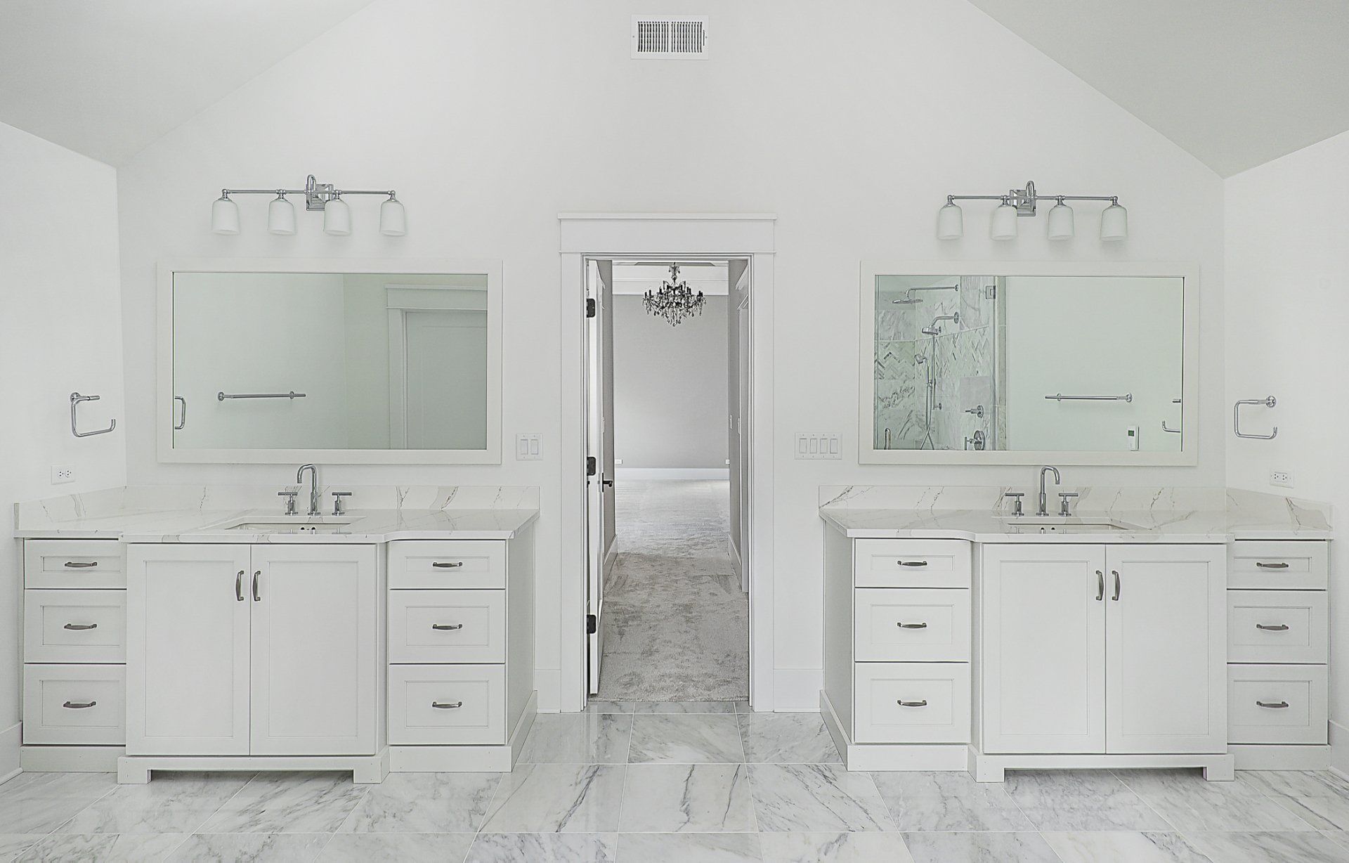 A bathroom with two sinks and two mirrors.