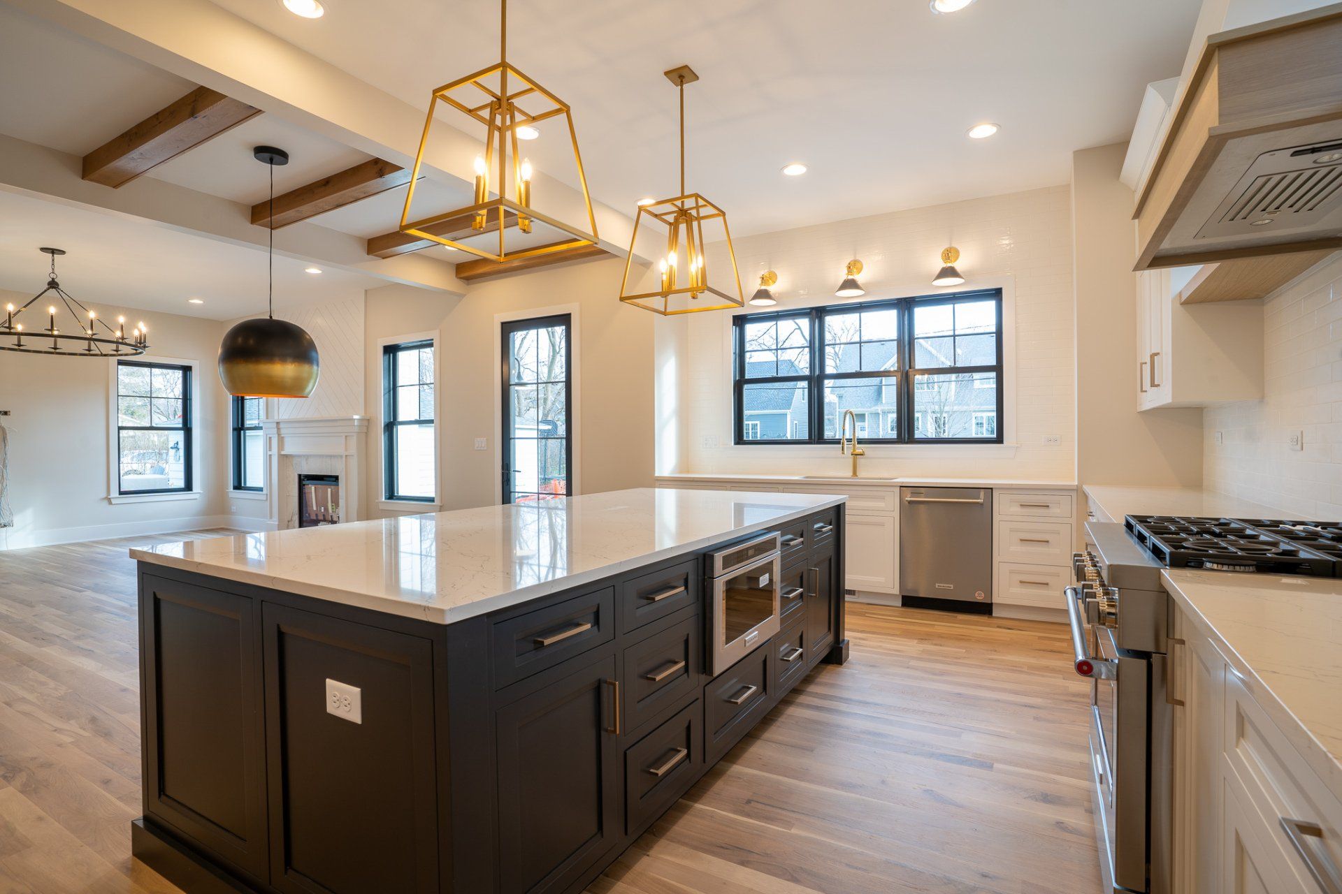 There is a large island in the middle of the kitchen.