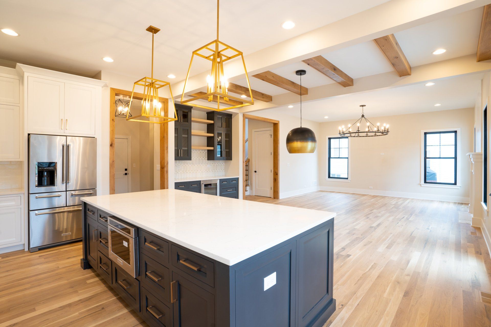 There is a large island in the middle of the kitchen.