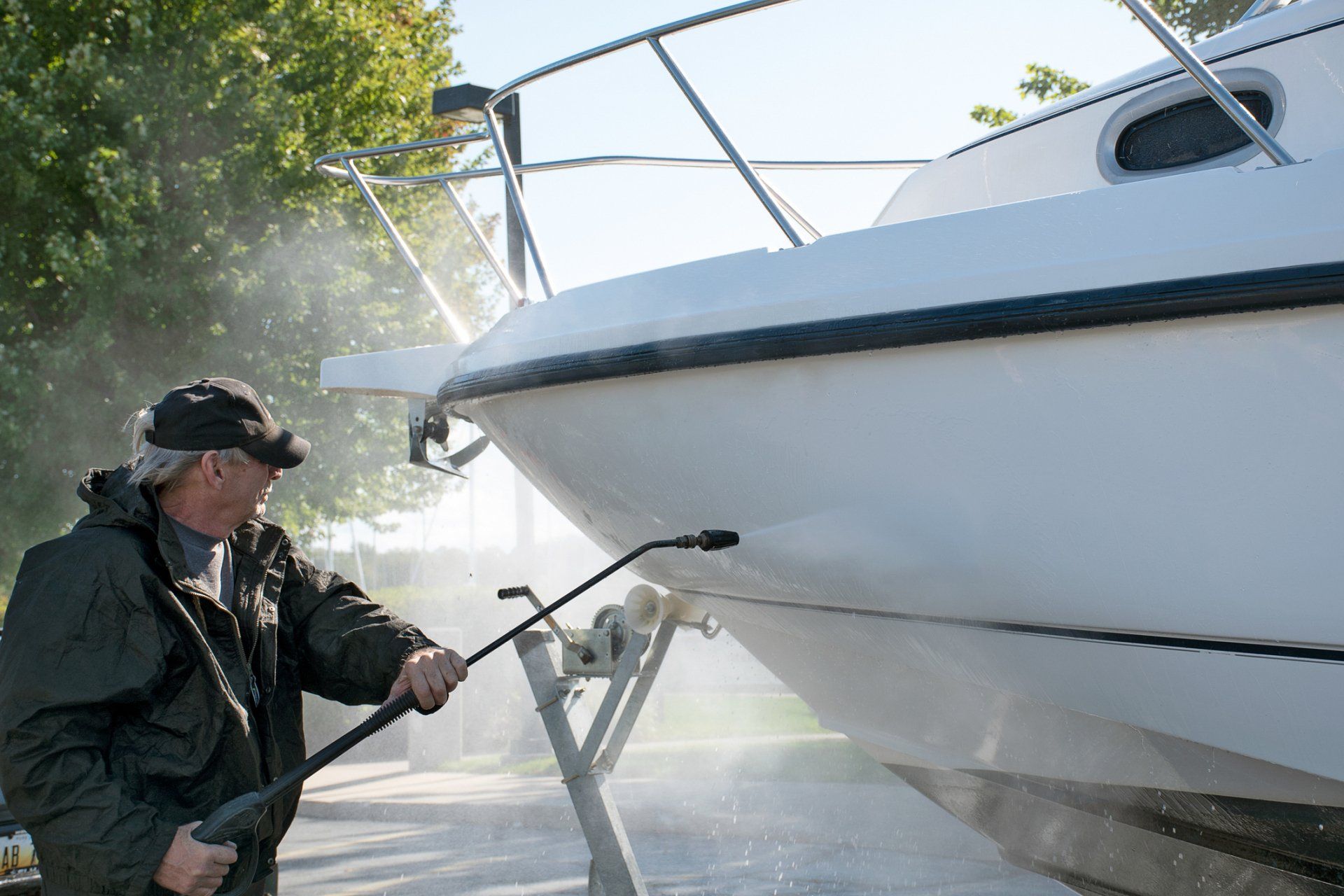 Man Washing A Boat - Auburn, WA - Auburn Sports & Marine