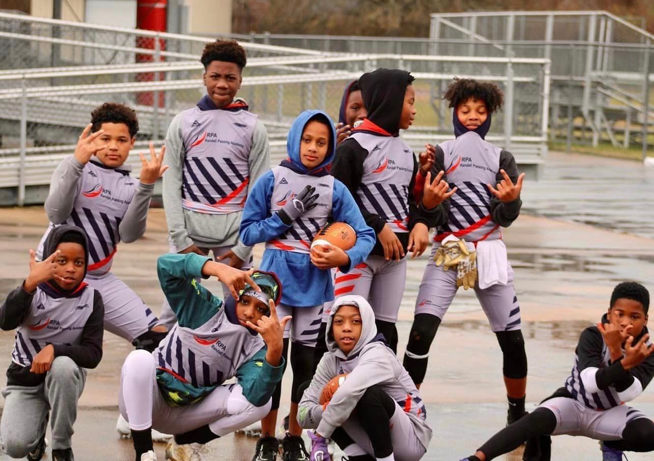 Group of boys wearing football uniform | Baton Rouge, LA | Randall Passing Foundation
