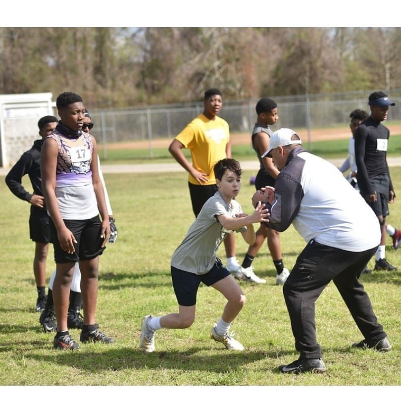 A coach training young men | Baton Rouge, LA | Randall Passing Foundation
