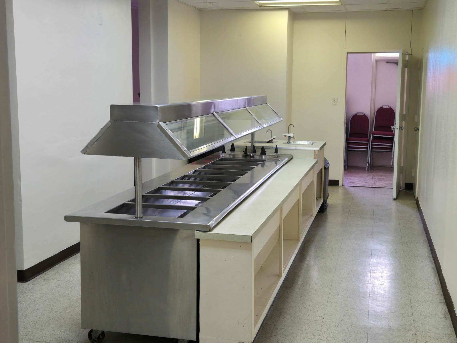 Full kitchen in the banquet hall food serving line.