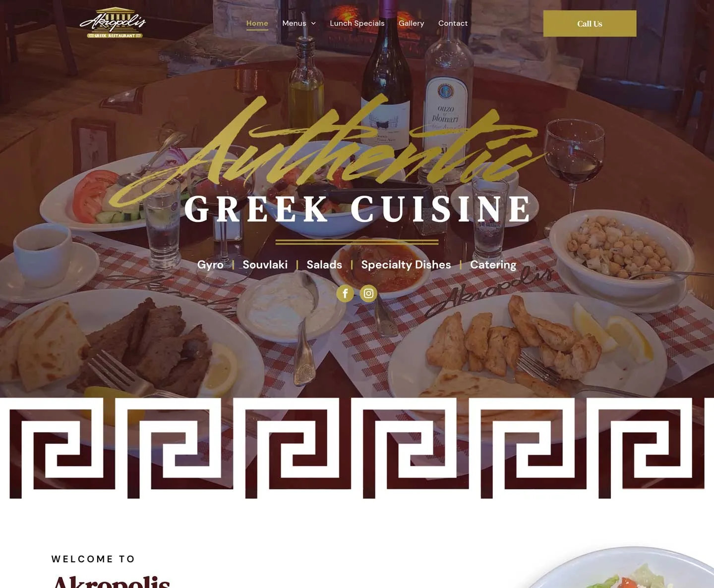 A website for authentic greek cuisine shows a table topped with plates of food.