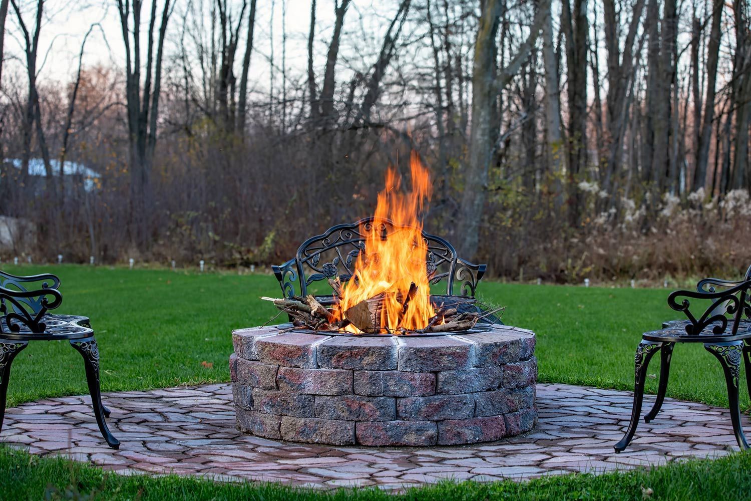 Constructed Firepit in Wide Backyard
