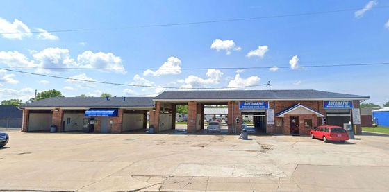 Pro car wash south location building with a truck parked in front of it.