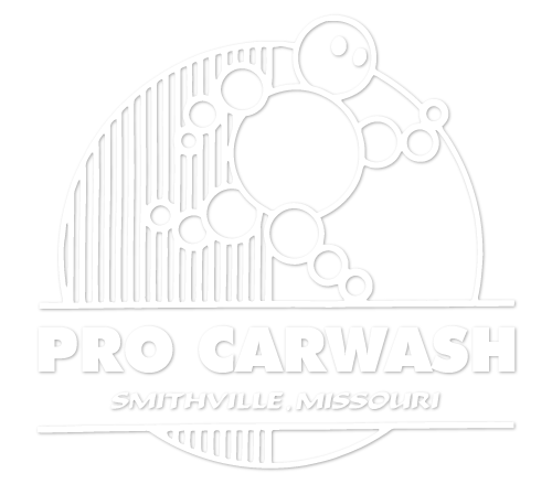 A white logo for pro car wash in smithville missouri.
