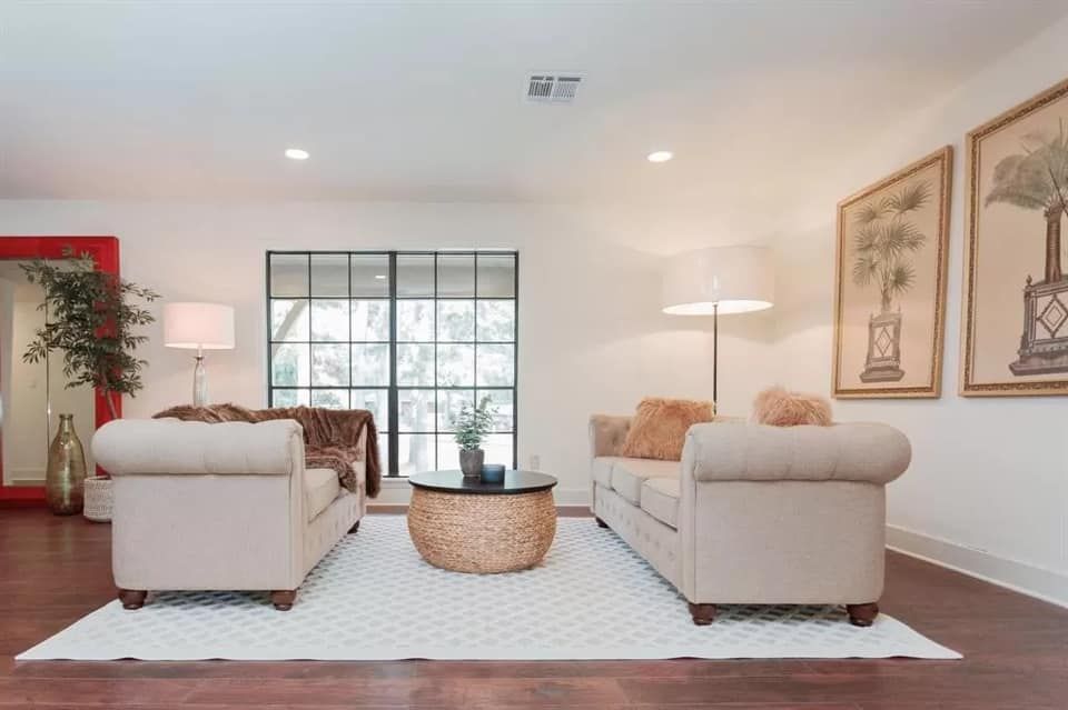 A living room with two couches and a coffee table.