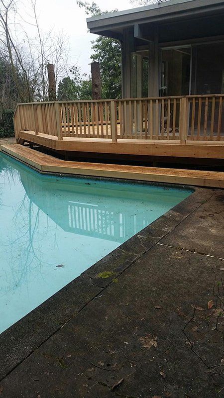 Wooden Fence with Swimming Pool — Auburn, WA — Rainier Fencing & Decking
