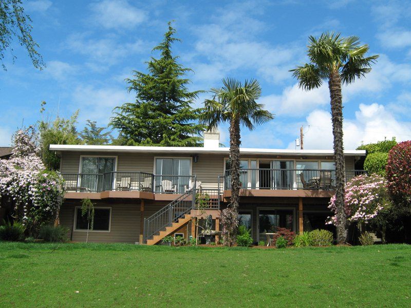 House with Railing Fence — Auburn, WA — Rainier Fencing & Decking