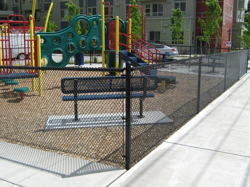 Chain Fence in Playground — Auburn, WA — Rainier Fencing & Decking