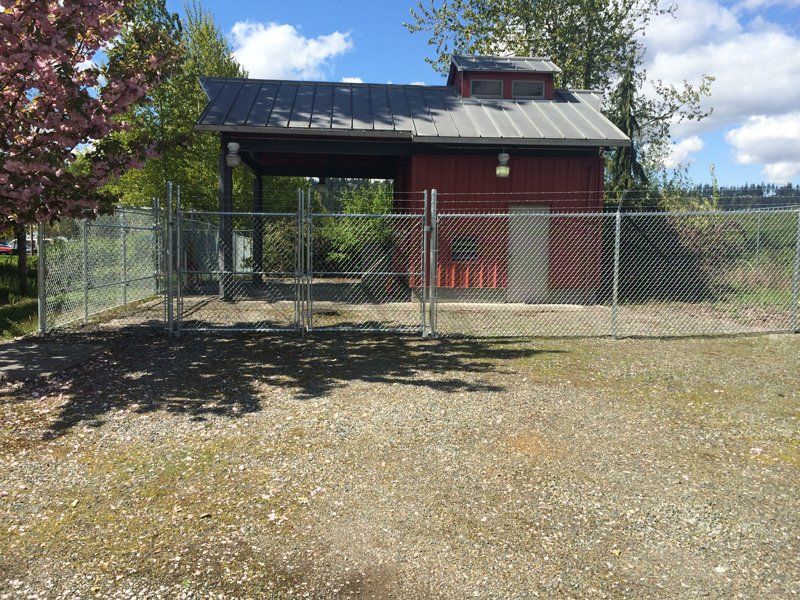 Wide Chain Fence — Auburn, WA — Rainier Fencing & Decking