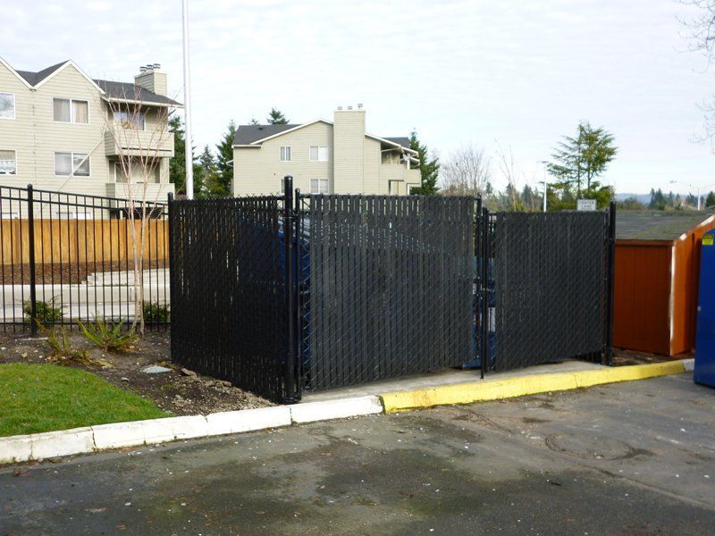 Black Chain Fence — Auburn, WA — Rainier Fencing & Decking