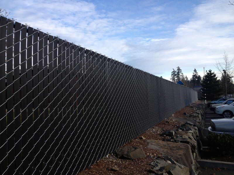 Black Long Chain Fence — Auburn, WA — Rainier Fencing & Decking