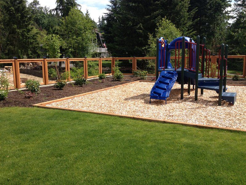 Brown Fence in Playground — Auburn, WA — Rainier Fencing & Decking