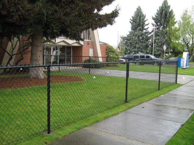 Black Chain Fence — Auburn, WA — Rainier Fencing & Decking