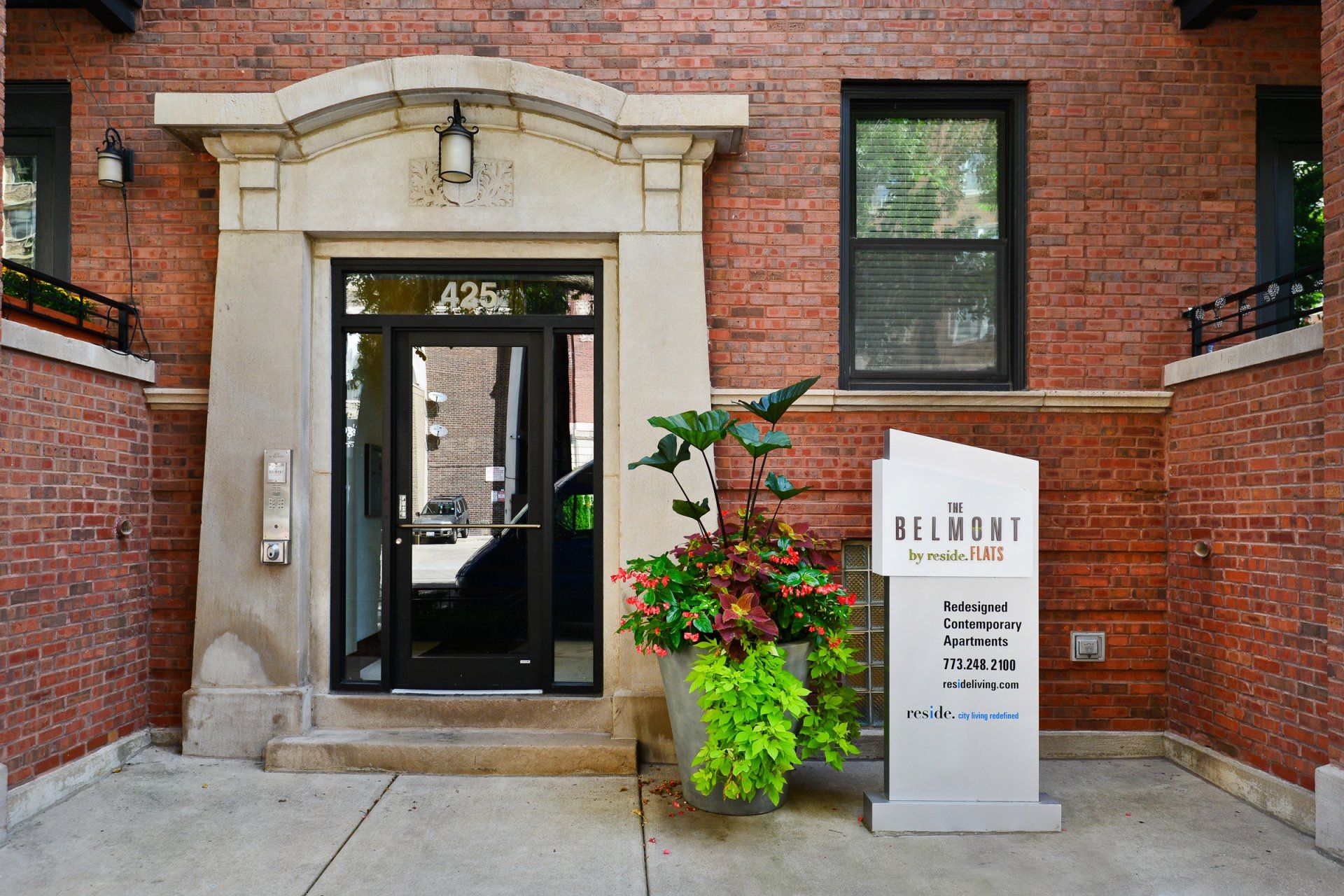 The Belmont by Reside Flats apartment front entrance.