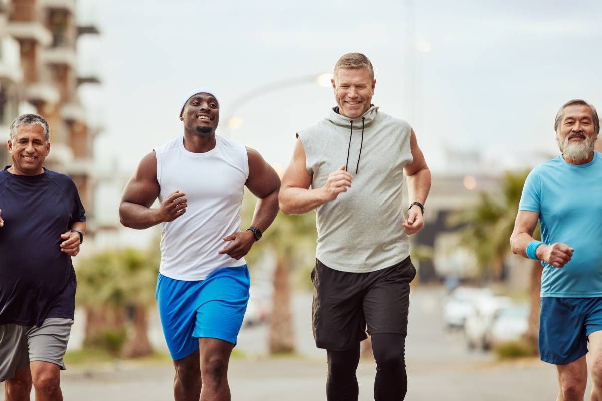 Senior friends running in a city as part of a summer workout near Lexington, Kentucky (KY)