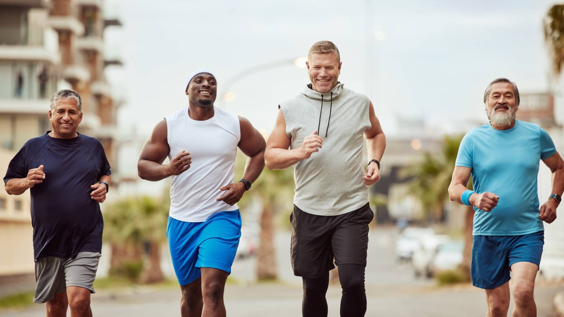 Senior friends running in a city as part of a summer workout near Lexington, Kentucky (KY)