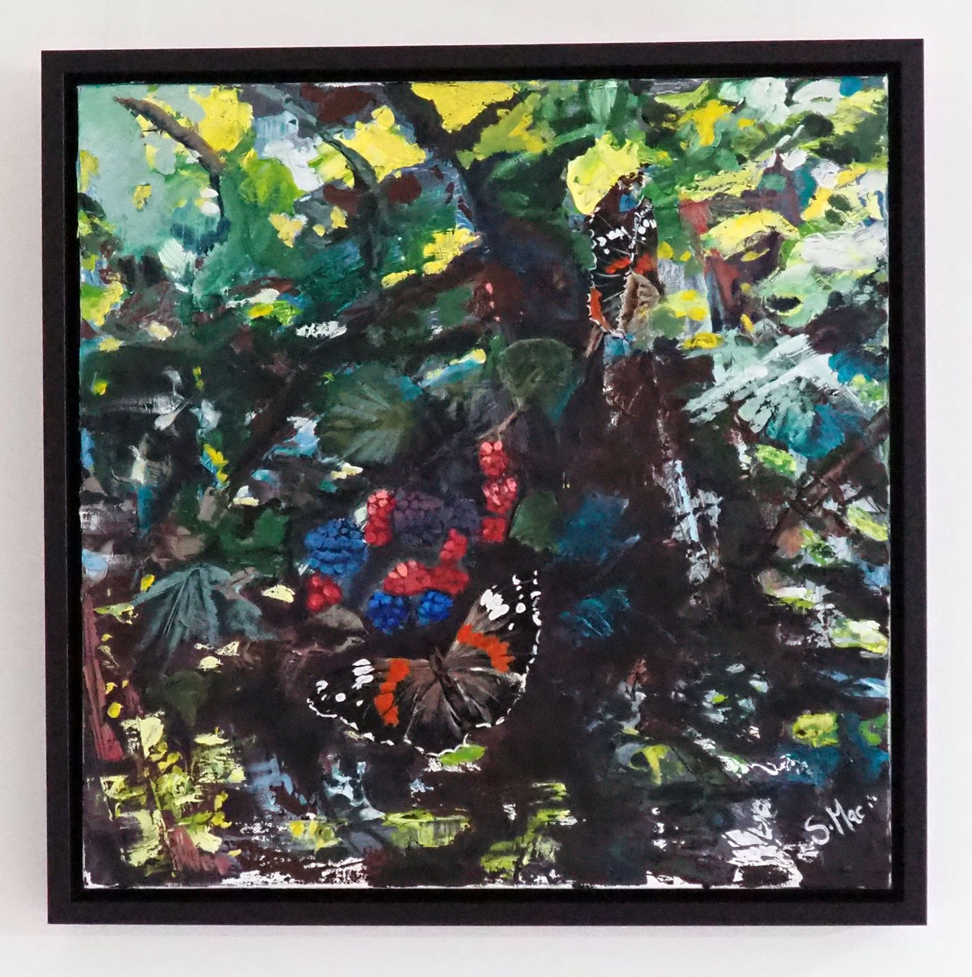 A square painting framed simply in black wood. Cool and warm greens and browns create brambles dappled in sunlight. Off centre is a bunch of black berries - reds, pinks, blues and purples. Two Red Admiral butterflies feature, one large, with open wings at the bottom of the berries and the other with wings closes towards the top right corner.