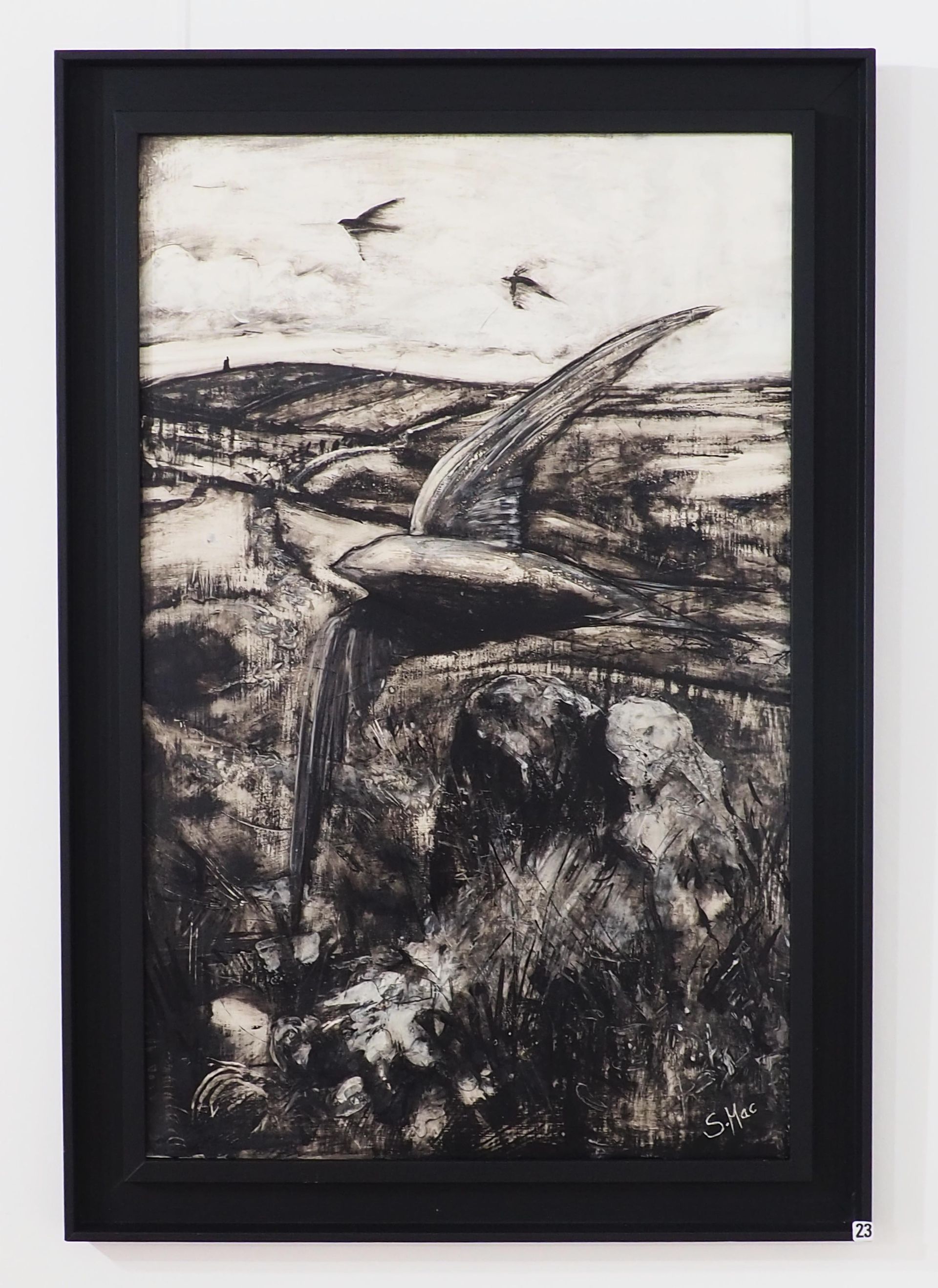 A black monotone image on a cream back ground. There are 3 swifts flying - one large in the foreground the other two simplified and small in the light coloured sky. Theres stones and foliage texture in the foreground below the bird and fields and trees behind the bird.