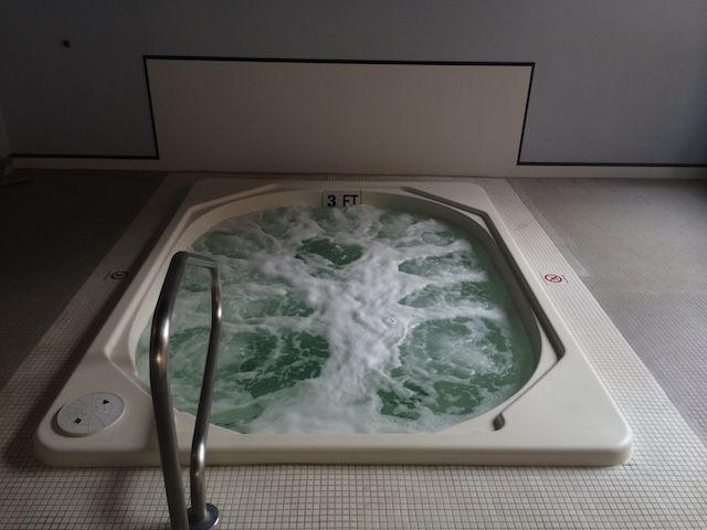 A jacuzzi with the number 3f on it