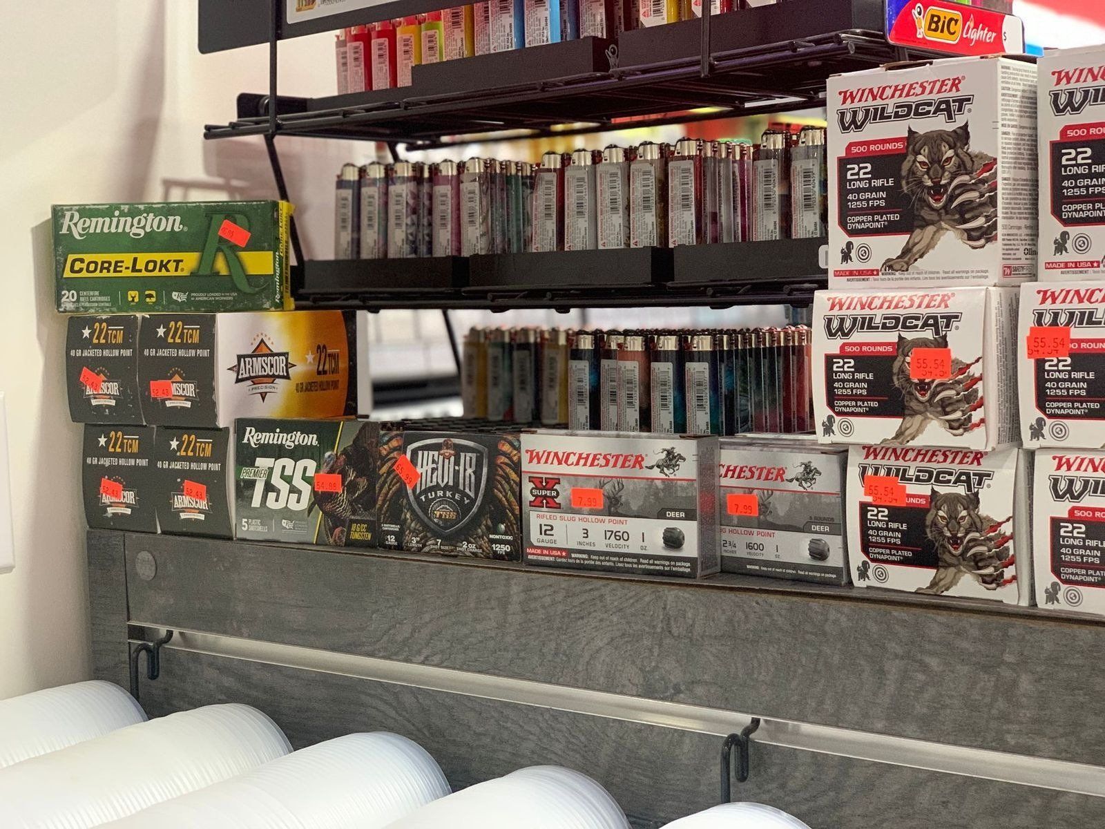 A shelf filled with boxes of winchester ammunition