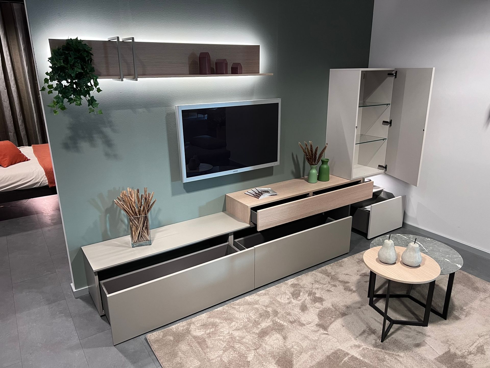 Immagine di un Living Ring di Tomasella, nelle finiture beige arena, rovere sabbia e madreperla