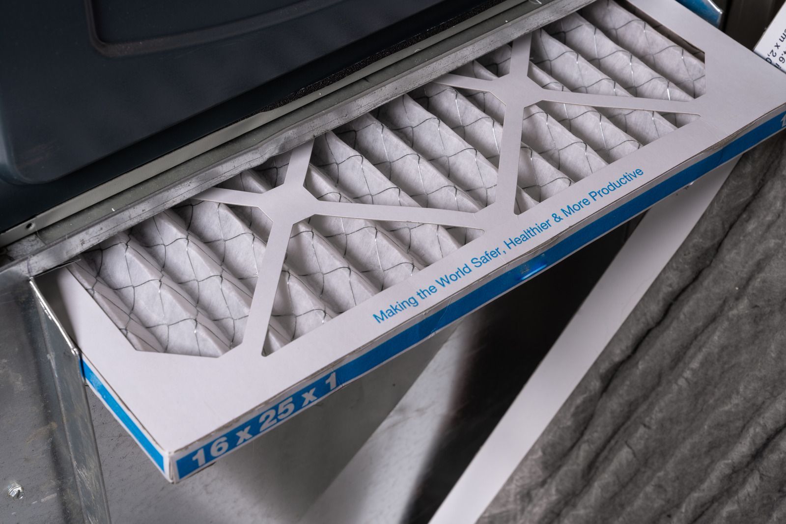 A box of air filter sitting on top of a table.