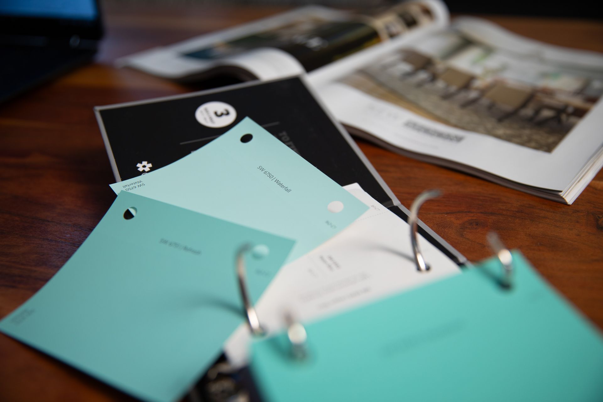 a bunch of papers are stacked on top of each other on a table