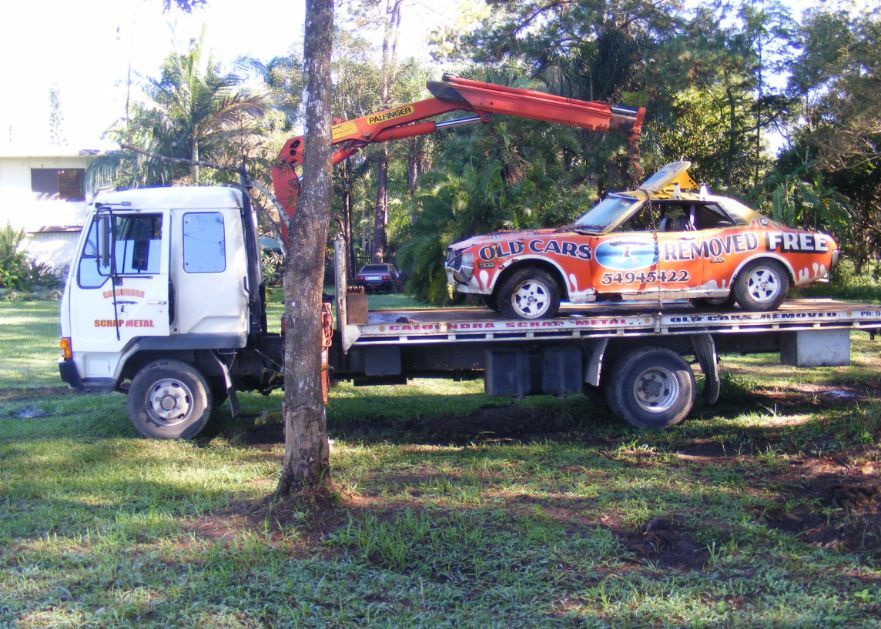 Towing red car — Caloundra Scrap Metal Beerwah, QLD