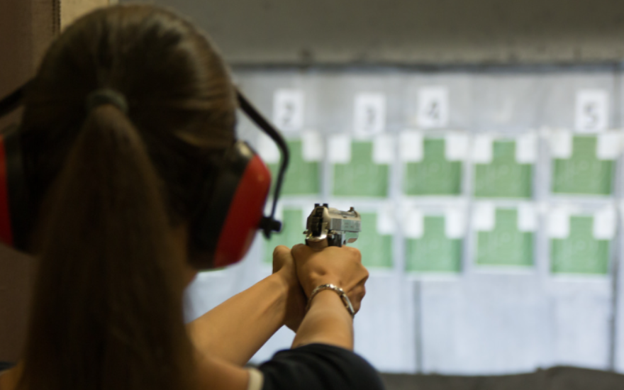 woman shooting a gun