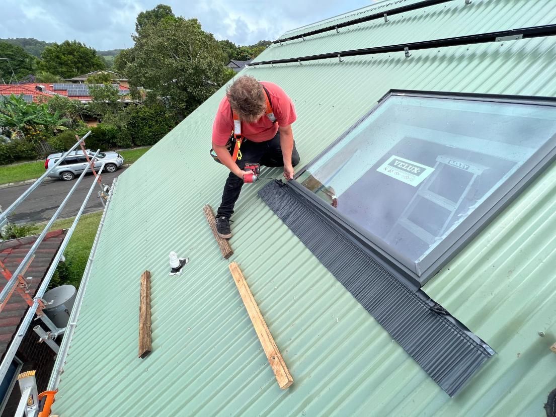 Roofer Installing Flashing Around a Skylight — Blue Sky Roofing NSW In Pottsville, NSW