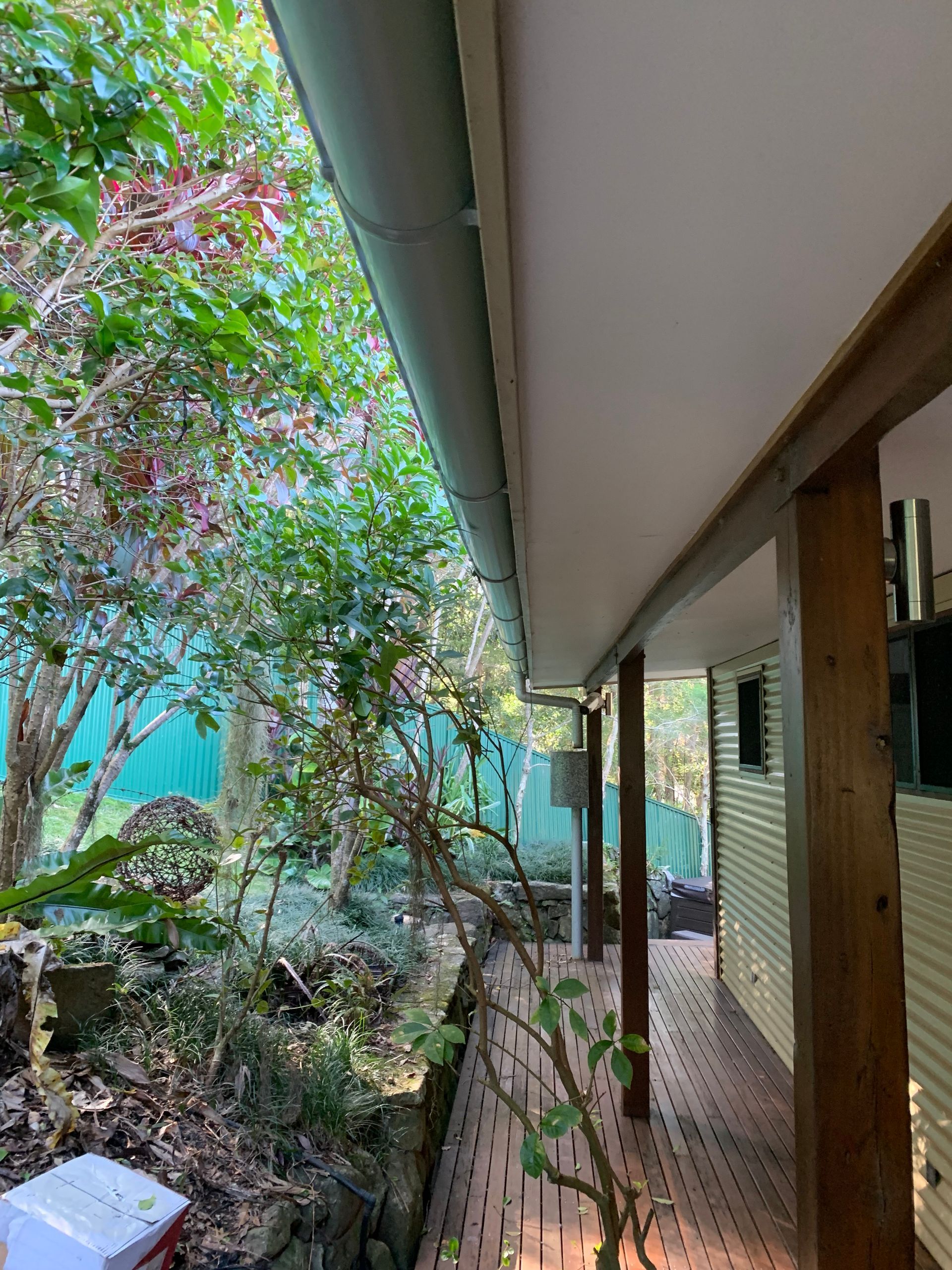 A green gutter under a white roof — Blue Sky Roofing NSW In Brunswick Heads, NSW