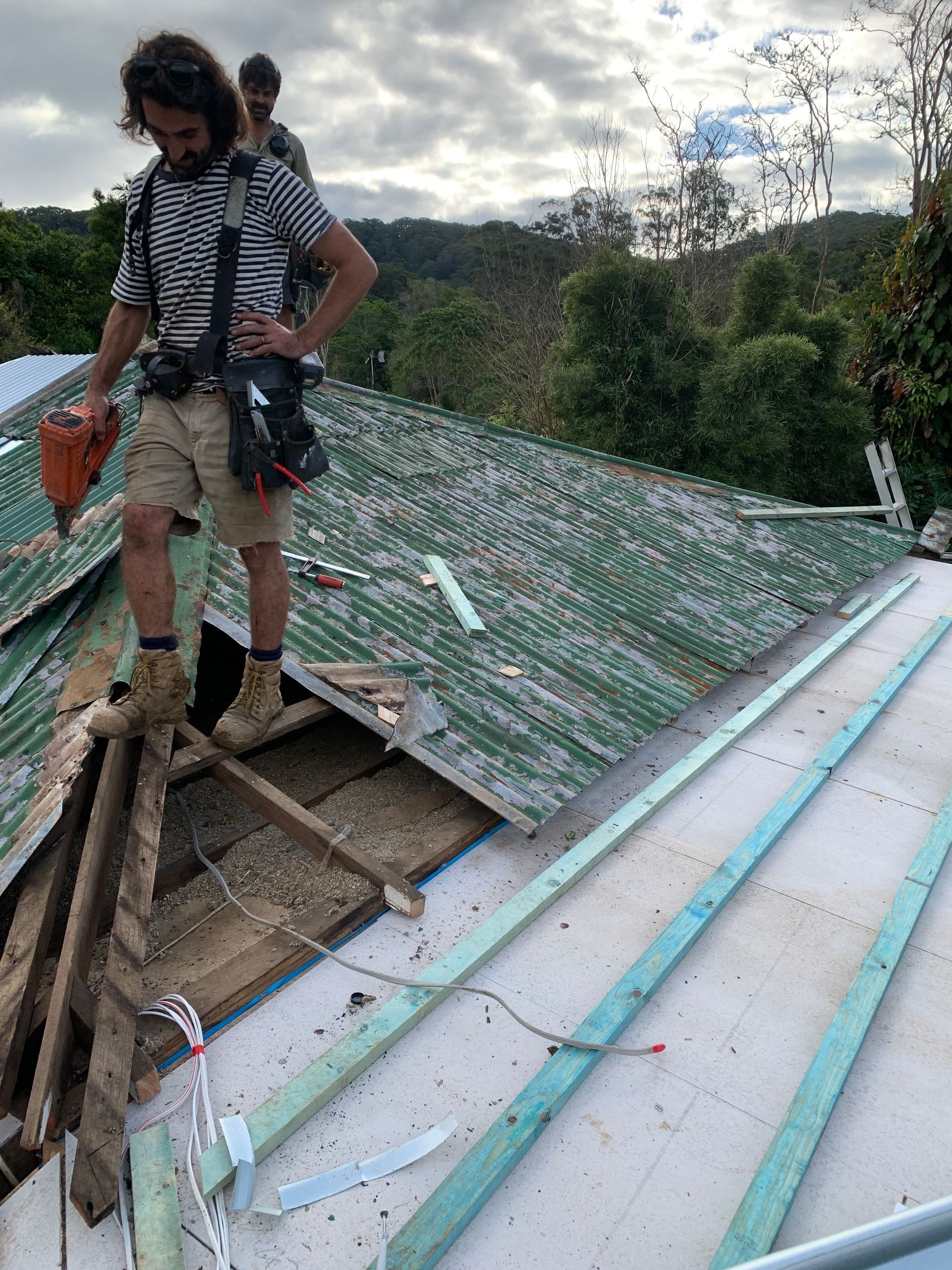 The top of a worn-down roof needing repairs — Blue Sky Roofing NSW In Mullumbimby, NSW