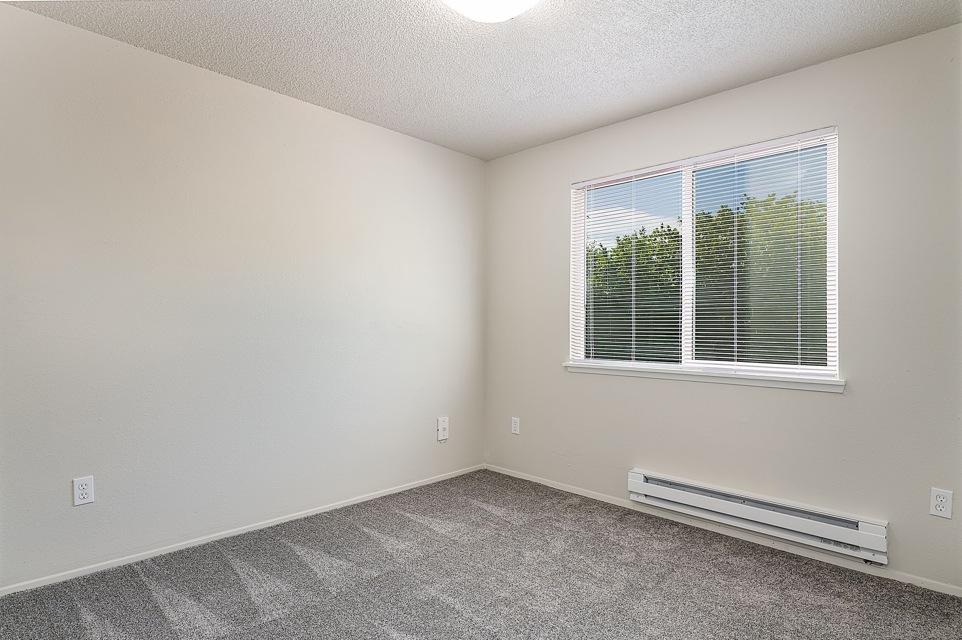 Photo showing a bedroom with a scenic view