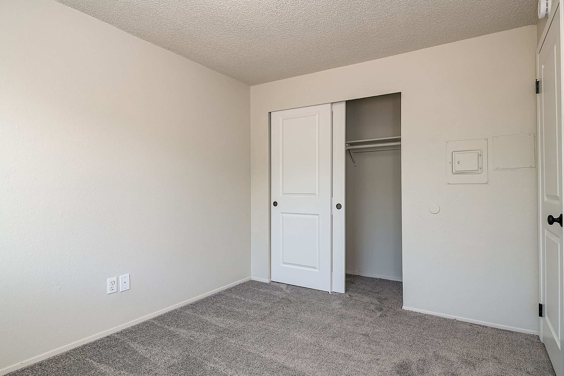 Photo showing a bedroom with natural light coming in