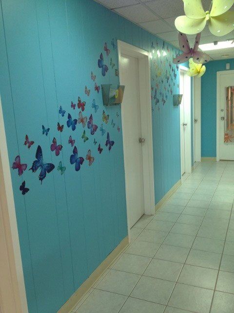 Hallway With Butterflies To Doctors Rooms — Toms River, NJ — Sunny Pediatrics, Inc.