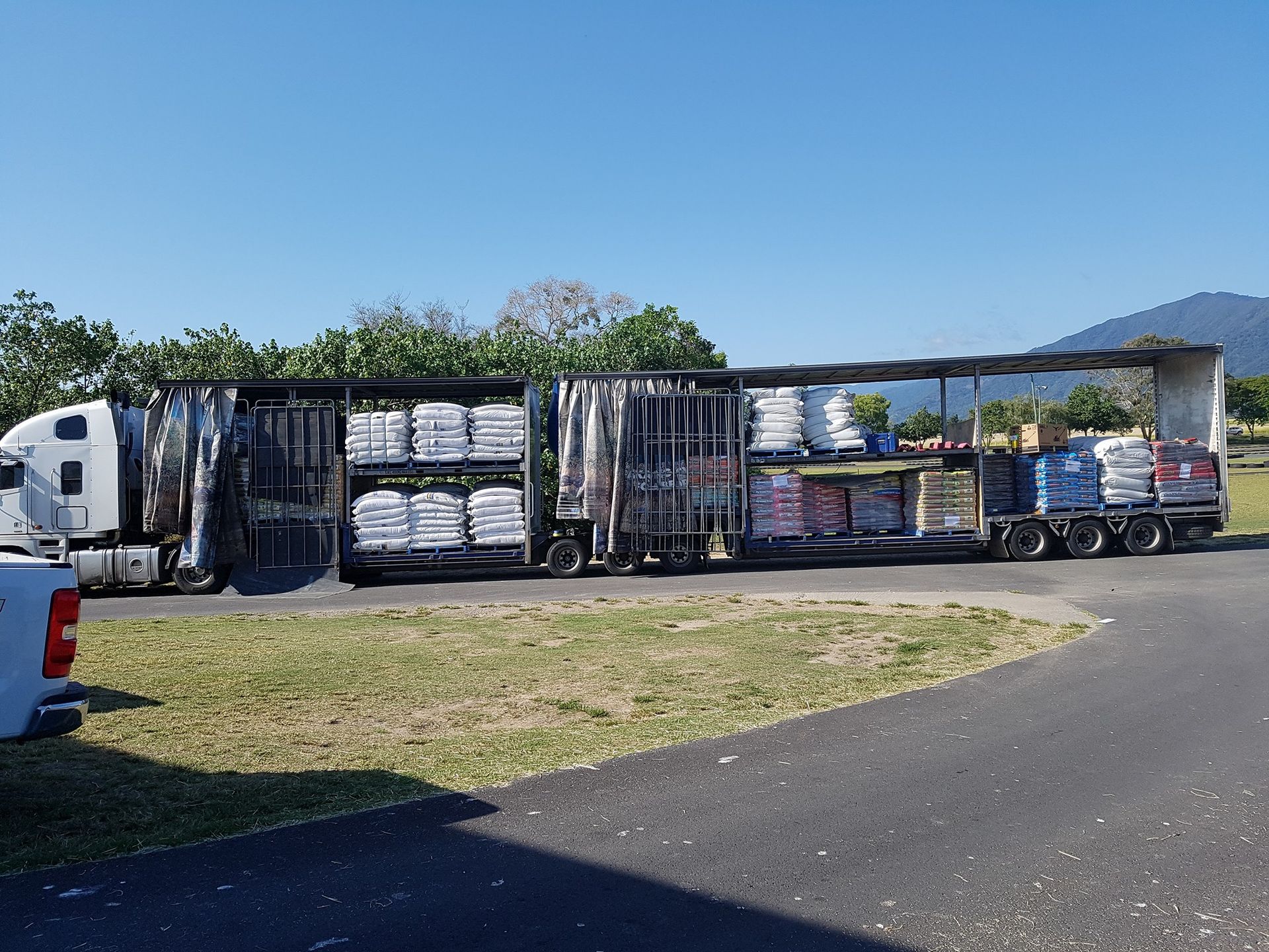 Semi-truck With Cargo of White — NQ Stockfeeds & Farm Supplies In Yorkeys Knob, QLD