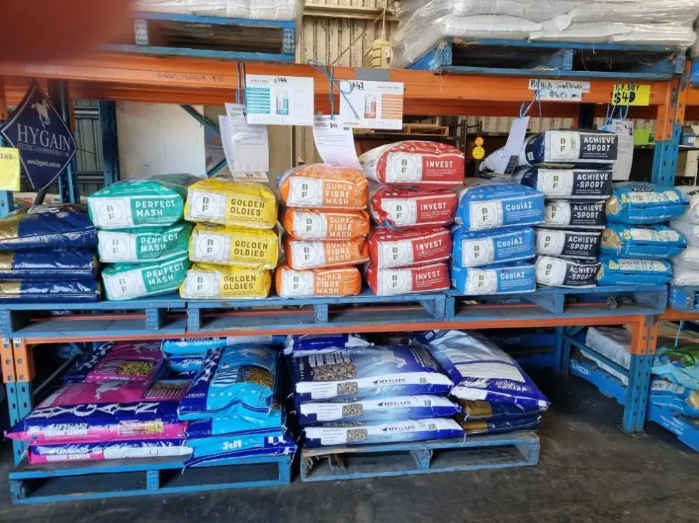 Pallets Stocked With Various Bags of Animal Feed — NQ Stockfeeds & Farm Supplies In Atherton, QLD