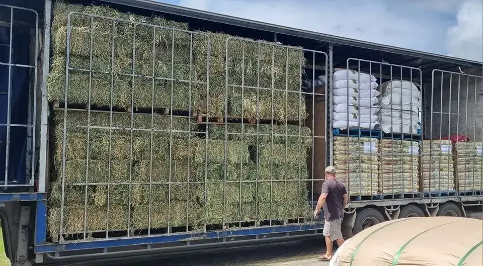 Truck Loaded With Hay Bales — NQ Stockfeeds & Farm Supplies In Mareeba, QLD