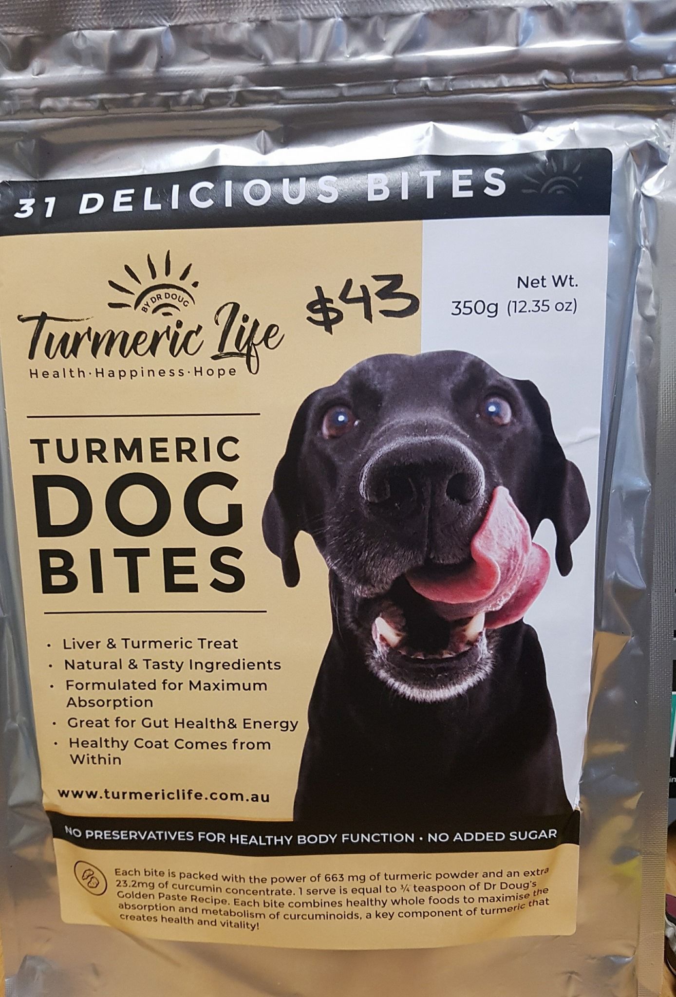 Silver Bag of Turmeric Life Dog Bites With a Black Dog Licking Its Lips — NQ Stockfeeds & Farm Supplies In Mareeba, QLD