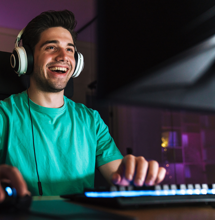 boy enjoying playing video games on hughesnet