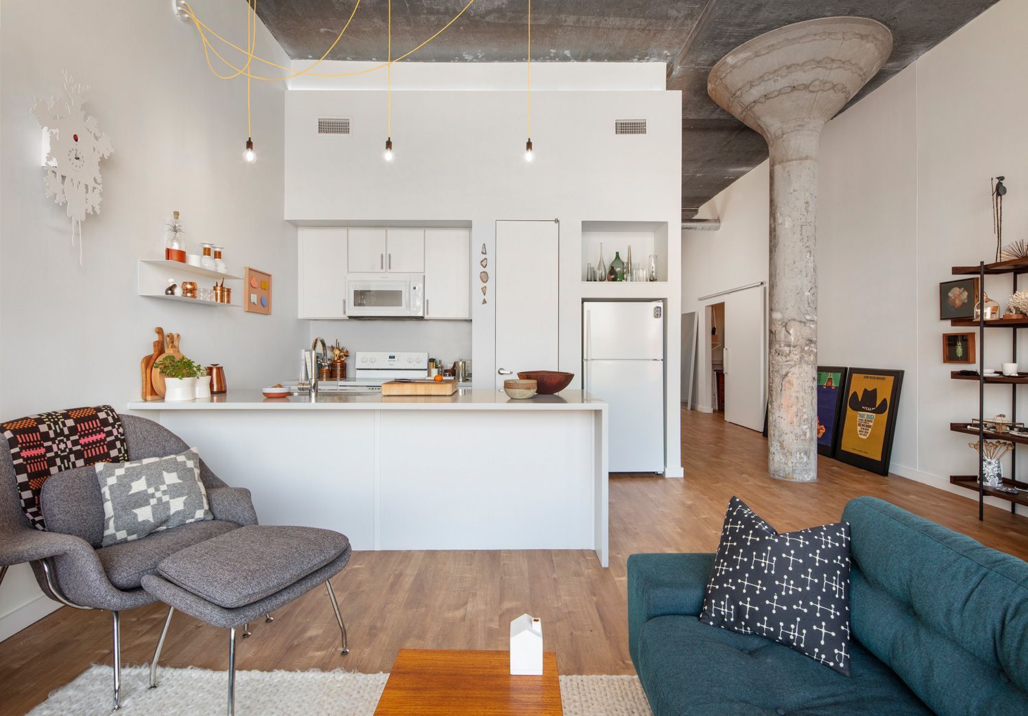 Kitchen featuring high ceilings and wooden floors