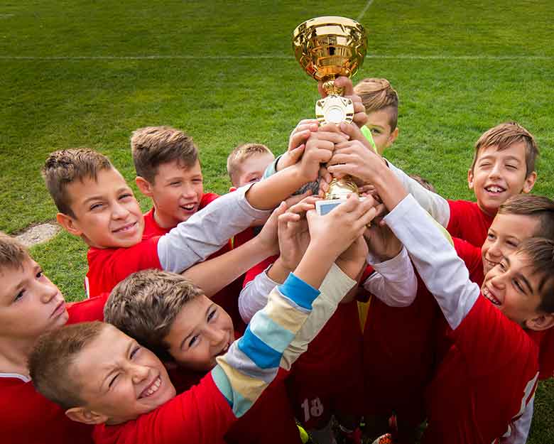 Kids Raising Up Trophy — Trophies And Engraving Services In Dapto, NSW